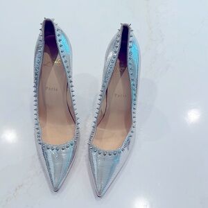 Authentic silver high heels shoes from louboutain worn only one time